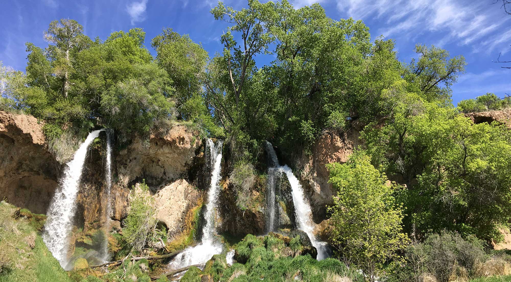 A triple waterfall is the centerpiece of Rifle Falls State Park.