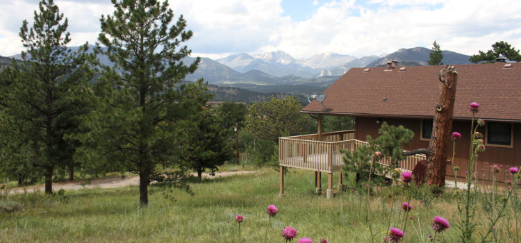 Estes Park Cabins: Where to Stay and Play Estes Park Cabins with Rocky Mountains in background
