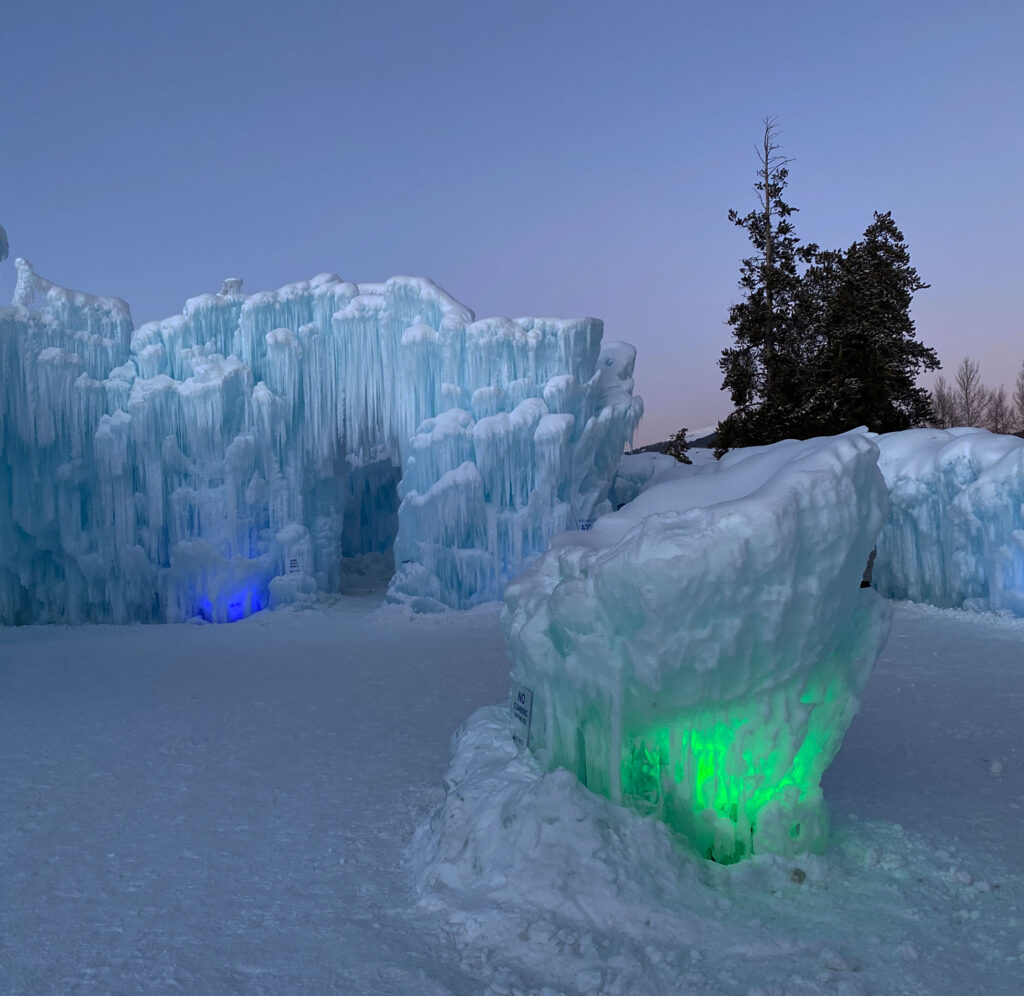 Ice Castles in Colorado lit up at night
