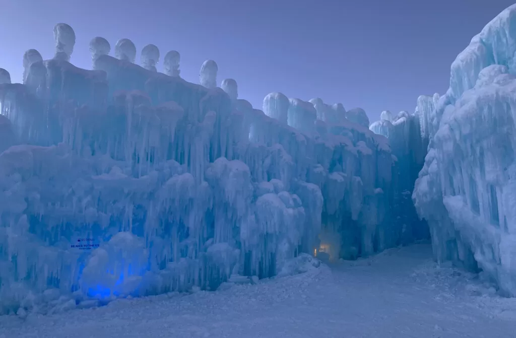 Ice Castles in Colorado at dusk