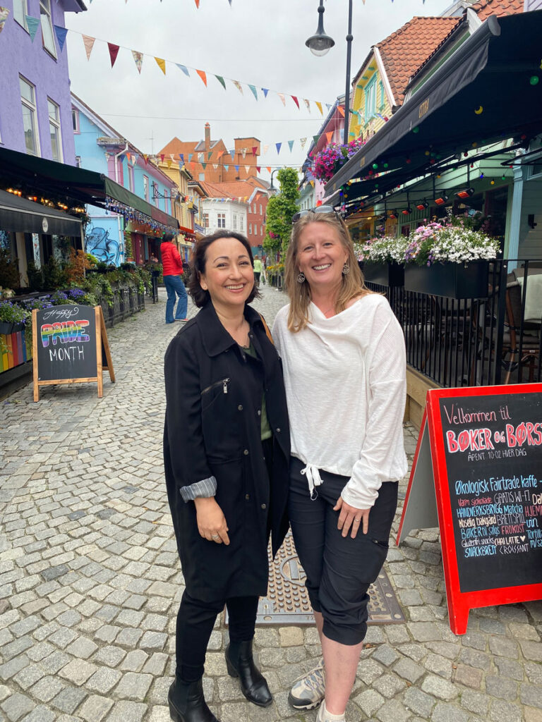 reconnecting with friends at Ovre Holmegate, known as stavanger's most colorful street
