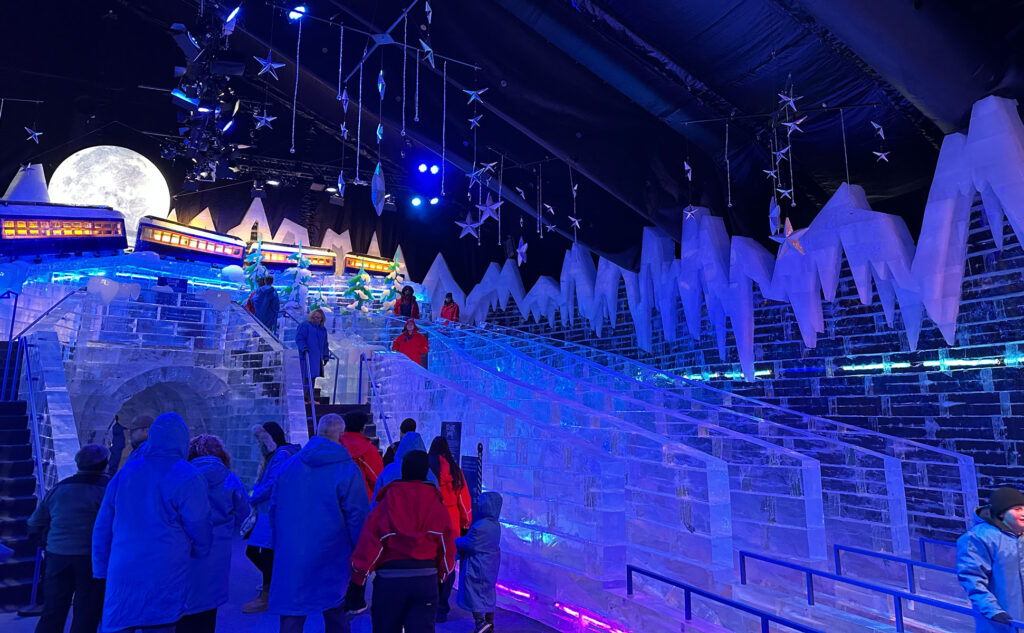 Slide down the ice slides at Christmas at Gaylord Rockies.